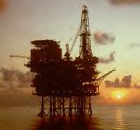 oil rig against sunset